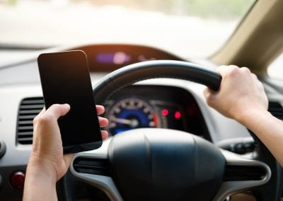 Driving While Using a Mobile Phone