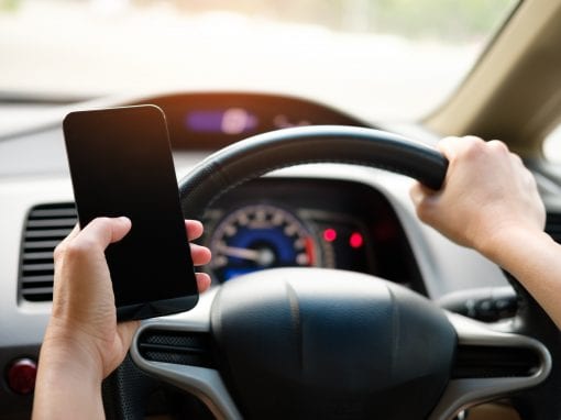 Driving While Using a Mobile Phone